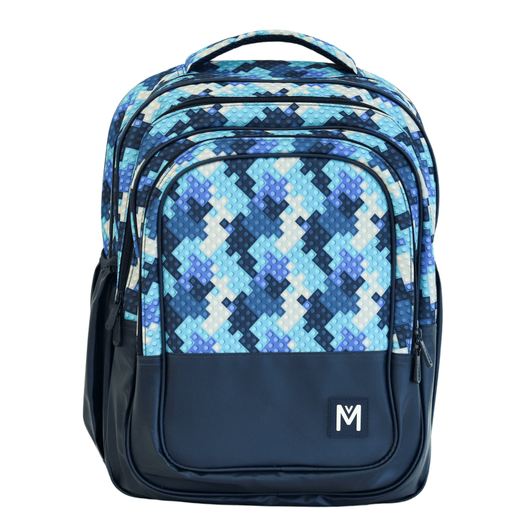 Childrens backpack by brand Montiico that is multi shades of blue with a block print on the top half and navy blue on the bottom.