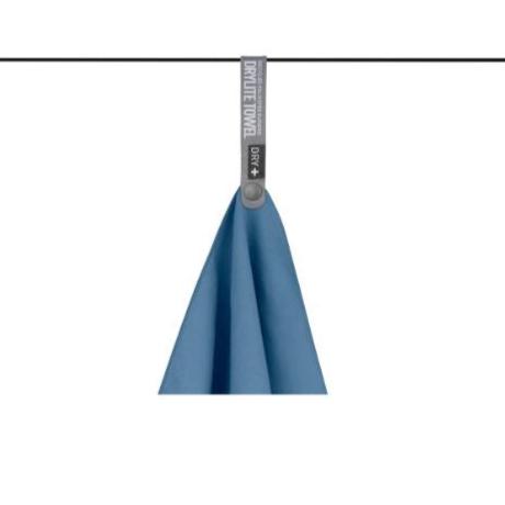 Corner of a Sea to Summit Drylite towel hanging on a line by its corner loop snap tab.