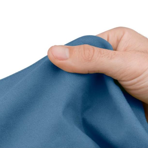 Close up of a mans hand holding a blue Sea to Summit Drylite towel showing the fabric.