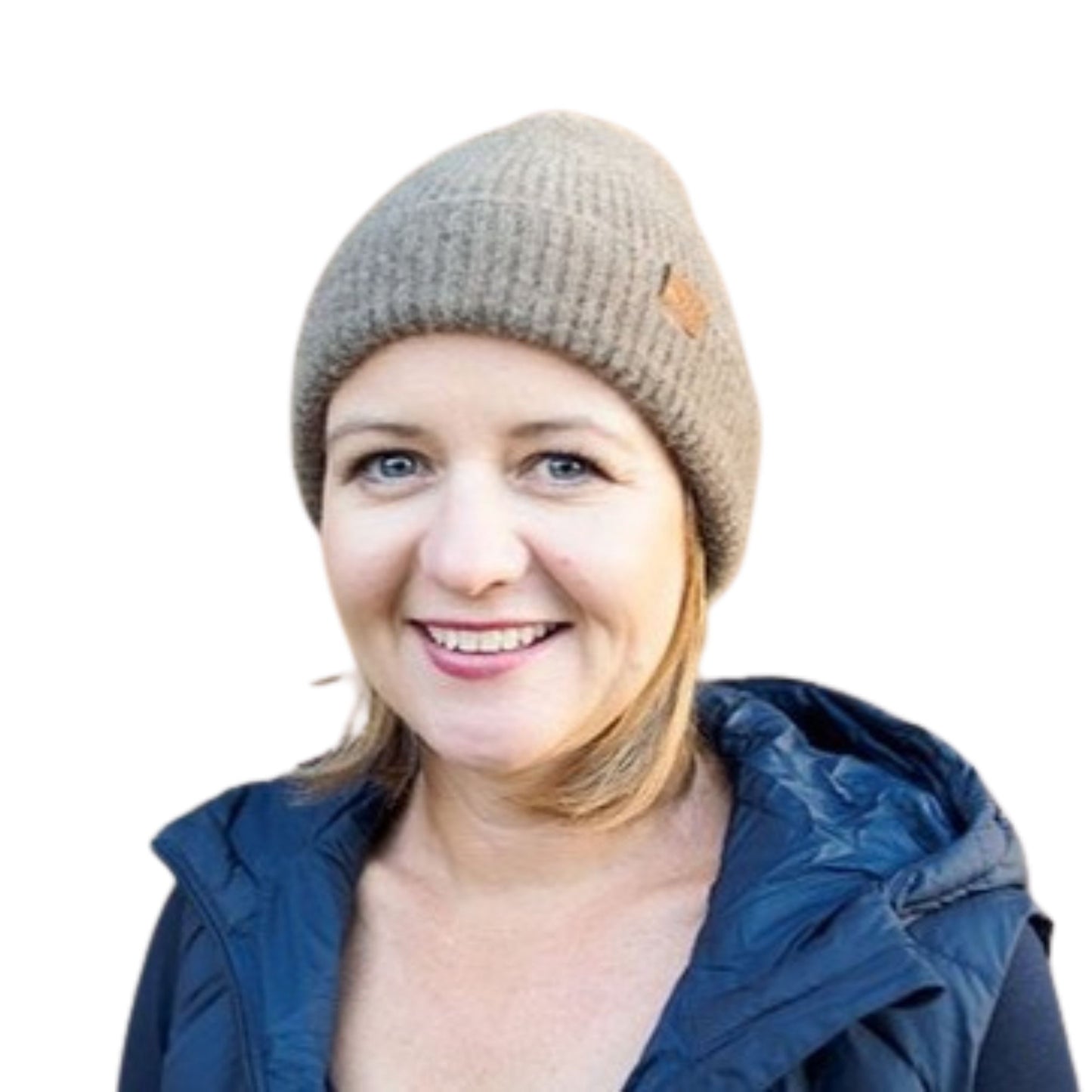 Portrait of a woman wearing a Wyld knit woolen beanie.