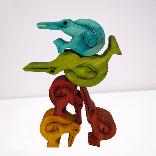 Wooden coloured balancing kiwis.