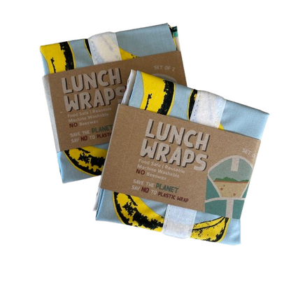 Two packages of banana print eco friendly lunch wraps packaged in a cardboard sleeve.