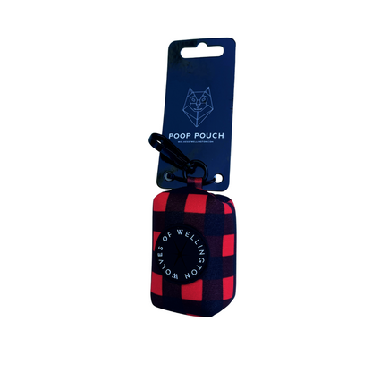 Neoprene dog poop bag pouch in red and black check pattern.