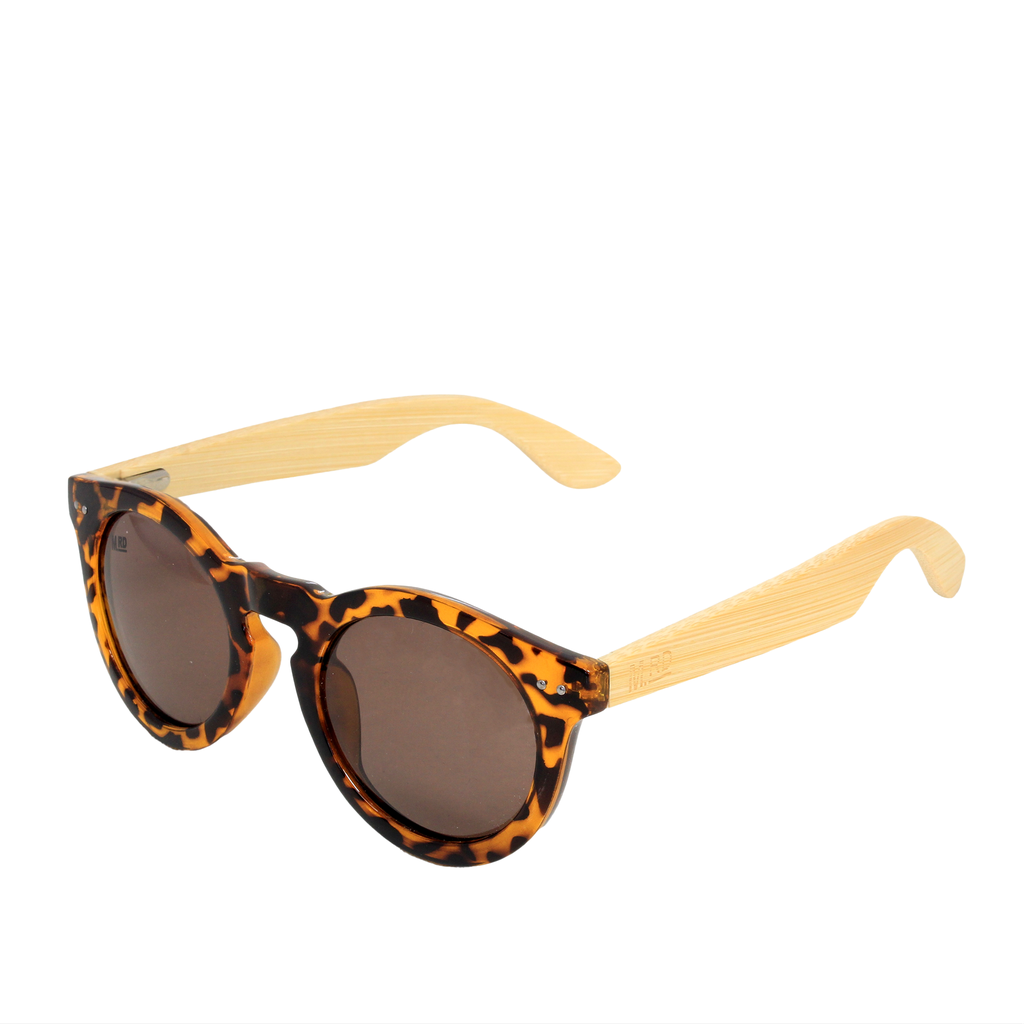 Tortoiseshell sunglasses with light natural wood temples and dark brown lenses, shown on a plain white background.