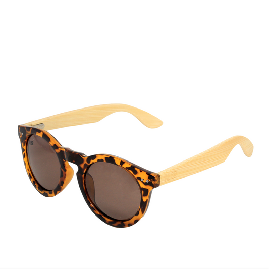 Tortoiseshell sunglasses with light natural wood temples and dark brown lenses, shown on a plain white background.