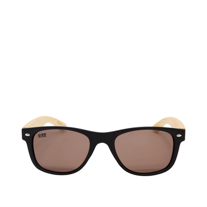 Black sunglasses with light wood temples and brown-tinted lenses, shown against a plain white background.