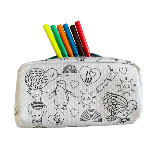 White pencil case with black outlines of New Zealand birds and other icons printed on it and 6 coloured felt pens sticking out the top.