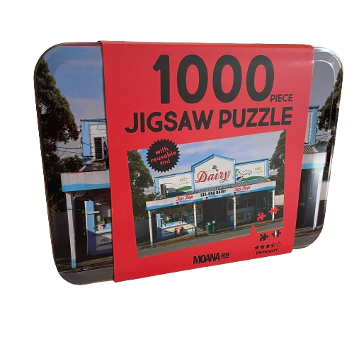 1000 piece puzzle featuring a picture of a New Zealand dairy store in a metal storage tin.