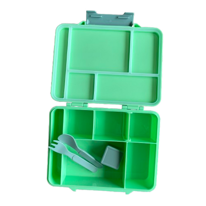 Kids minty green bento style lunch box showing the inside compartments and cutlery accessories.