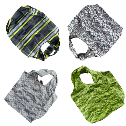 Four nylon tote bags in various shades of grey, black and green.