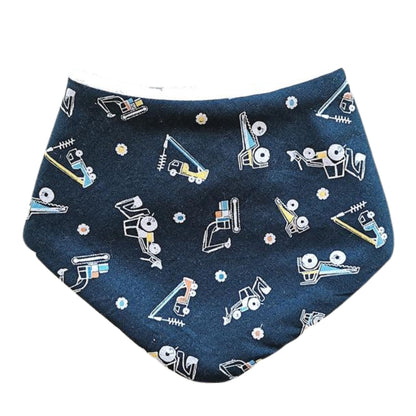 Baby dribble bib in dark teal fabric with construction vehicle print.