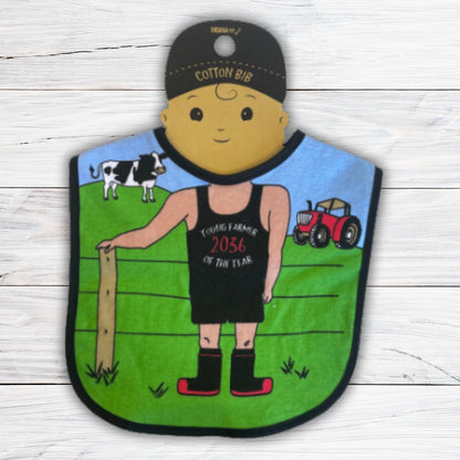 Baby bib with a farm scene and child farmer body.