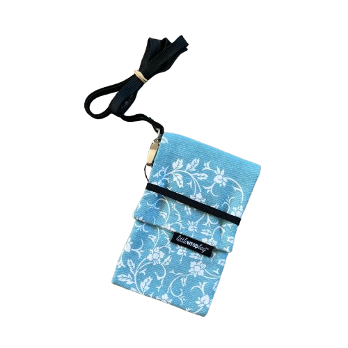 Blue phone pouch bag with white floral print and black lanyard.