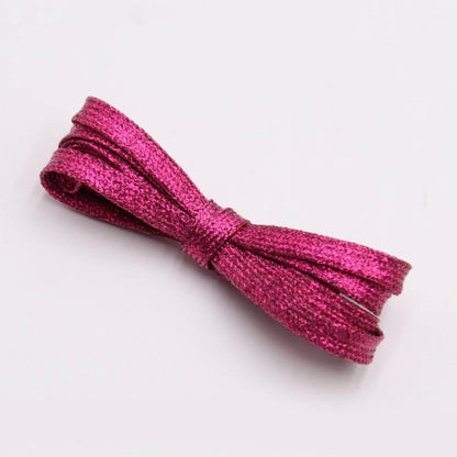 Pink metallic shoelaces.