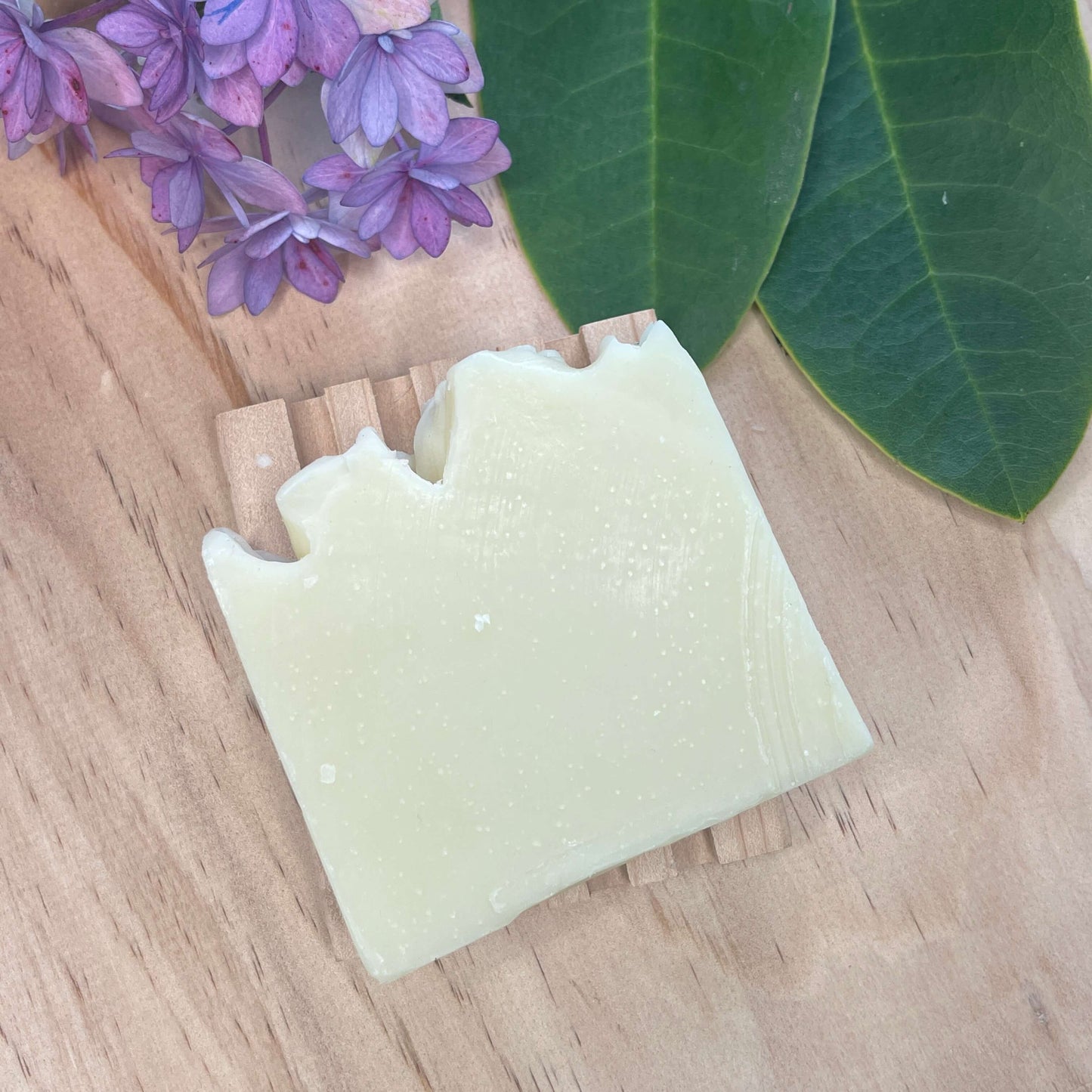 Natural soap on a wooden soap rack.