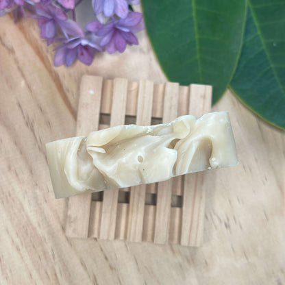 Natural soap on a wooden soap rack.