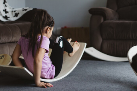 Little Earth rockit balance board. Made in New Zealand. And with a child at play.