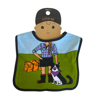 Baby bib with a farmer girls body, a farm dog and a bale of hay.