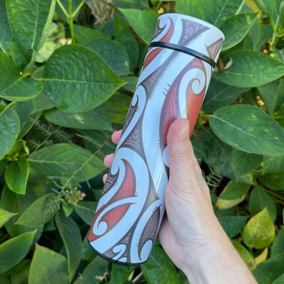 Drink bottle with black, white and red koru design.